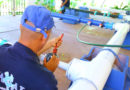 Trabajadores de ENACAL realizando labores en tuberías de agua y saneamiento